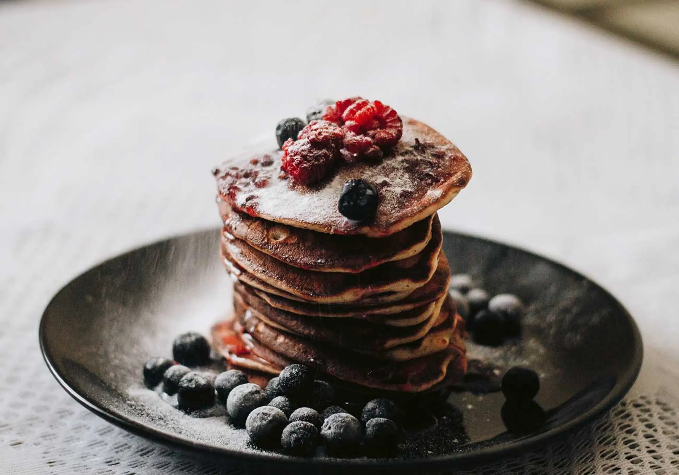 stack of pancakes with berries