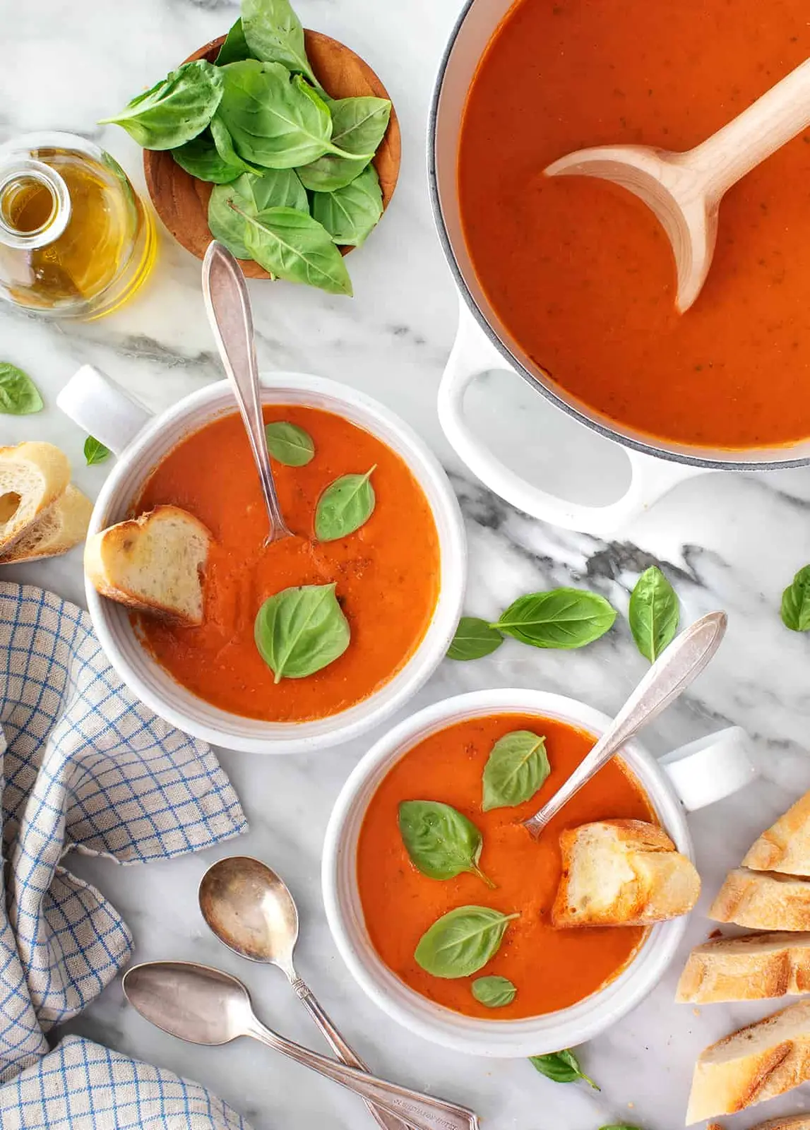 bowls of creamy tomato basil soup